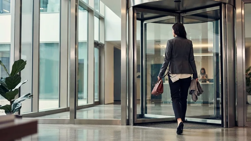 A woman leaving an office building